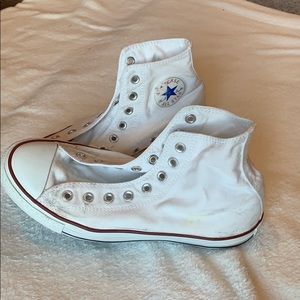 White high top Converse with missing laces